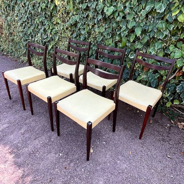 6 Scandinavian chairs with pale yellow skai seats