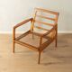 Elegant mid-century armchair from the 1960s with cream-white upholstery
