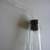 Old bottle with glass pipette