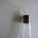Old bottle with glass pipette