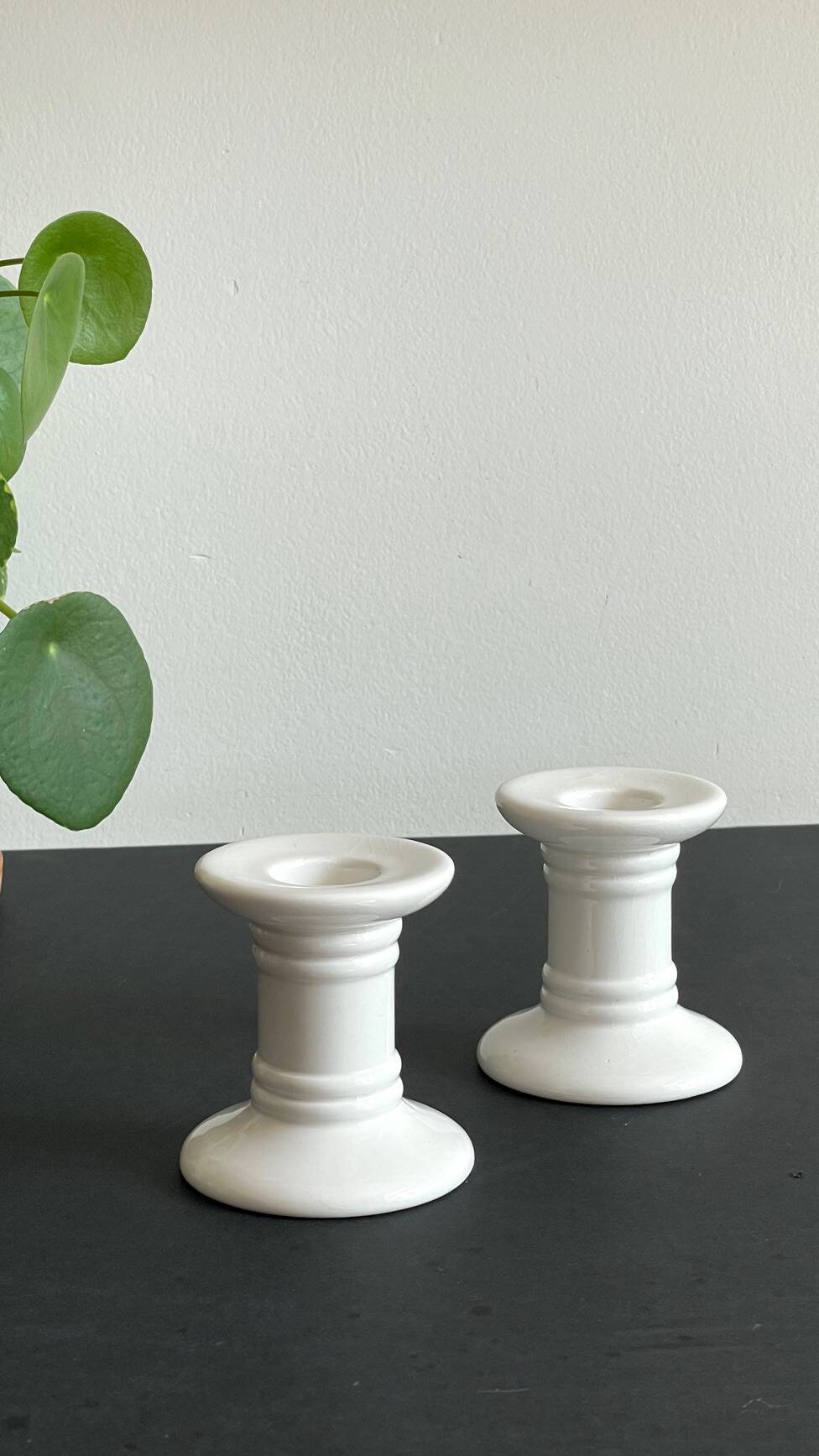 Pair of White Ceramic Candlesticks
