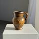 Speckled stoneware jug with grape pattern H17