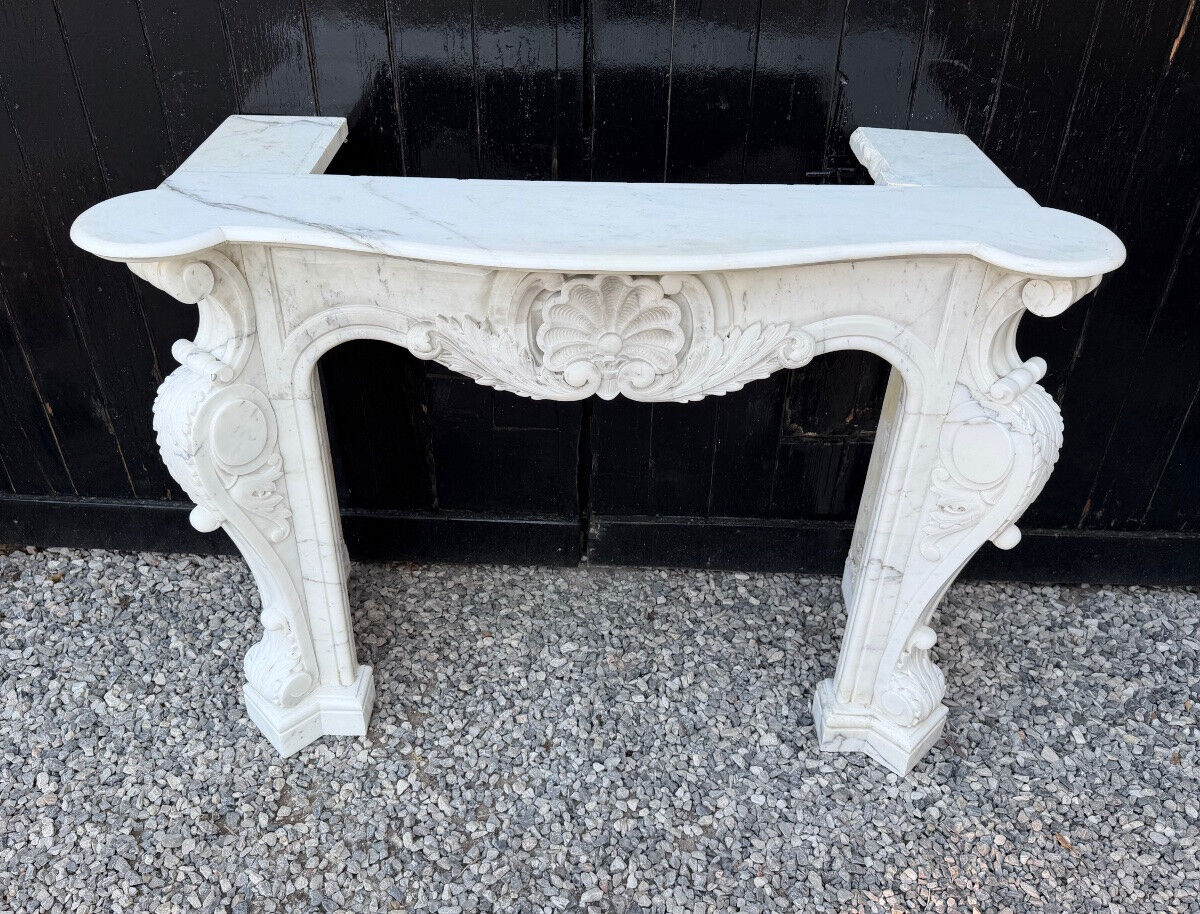 Louis XV style fireplace in Carrara marble, circa 1980.