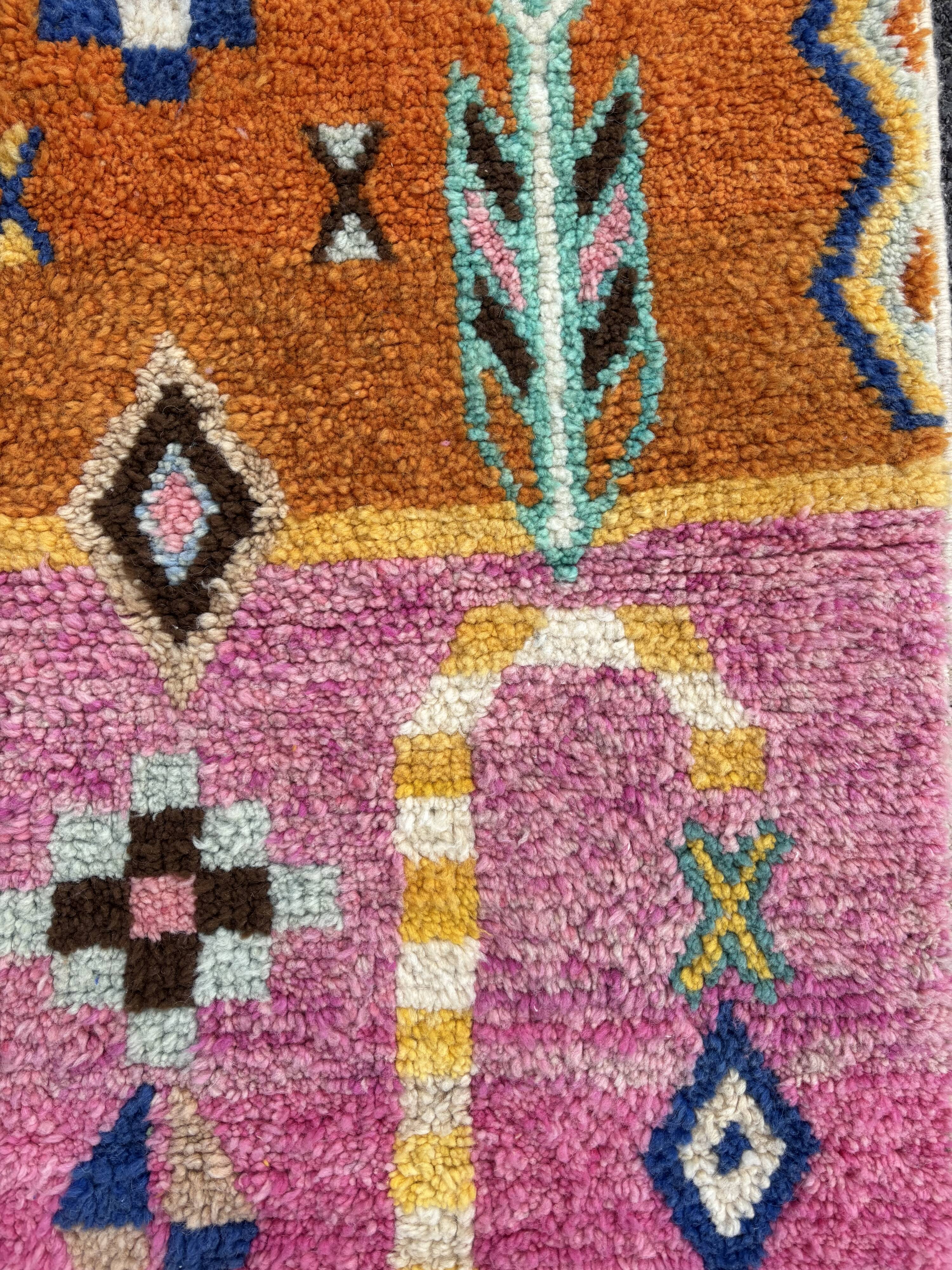 Boho chic Moroccan pink wool rug