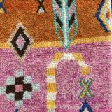 Boho chic Moroccan pink wool rug