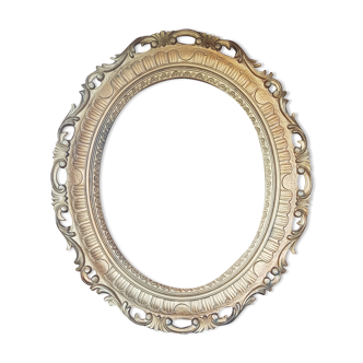 Large golden oval frame
