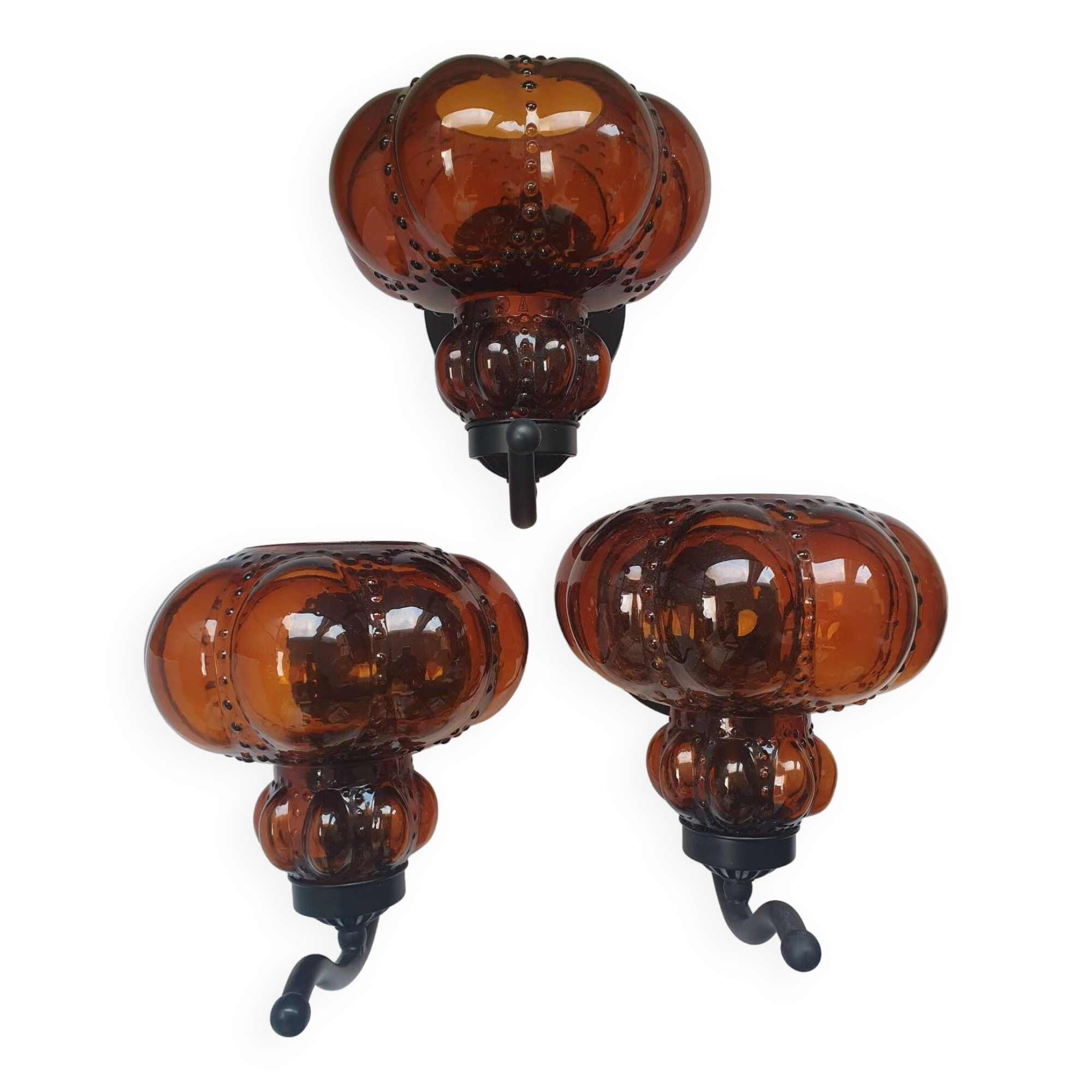 Three large vintage brown glass wall lights