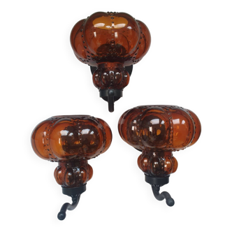 Three large vintage brown glass wall lights