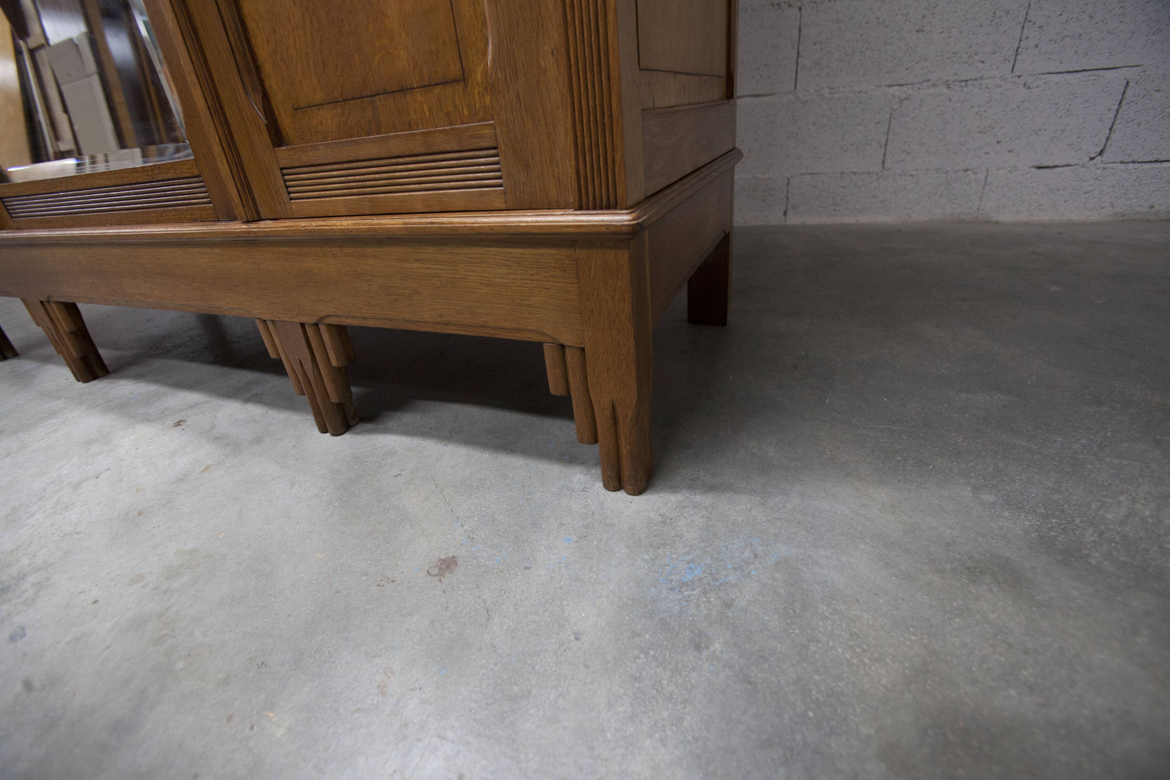 Art Deco carved oak wardrobe - Flemish workshop circa 1930