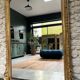Antique mirror 183.5/116cm with pediments and pearl detailing in gold leaf.