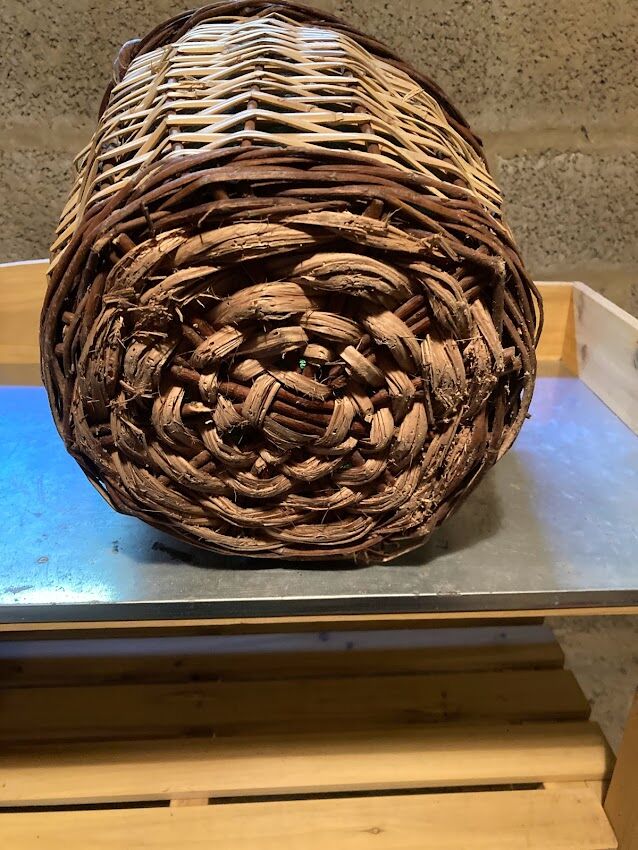 Dame-jeanne in 10L glass and wicker basket, old