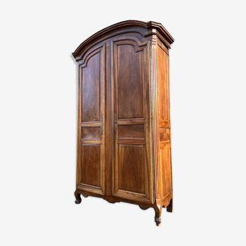 Walnut castle cabinet of the eighteenth century