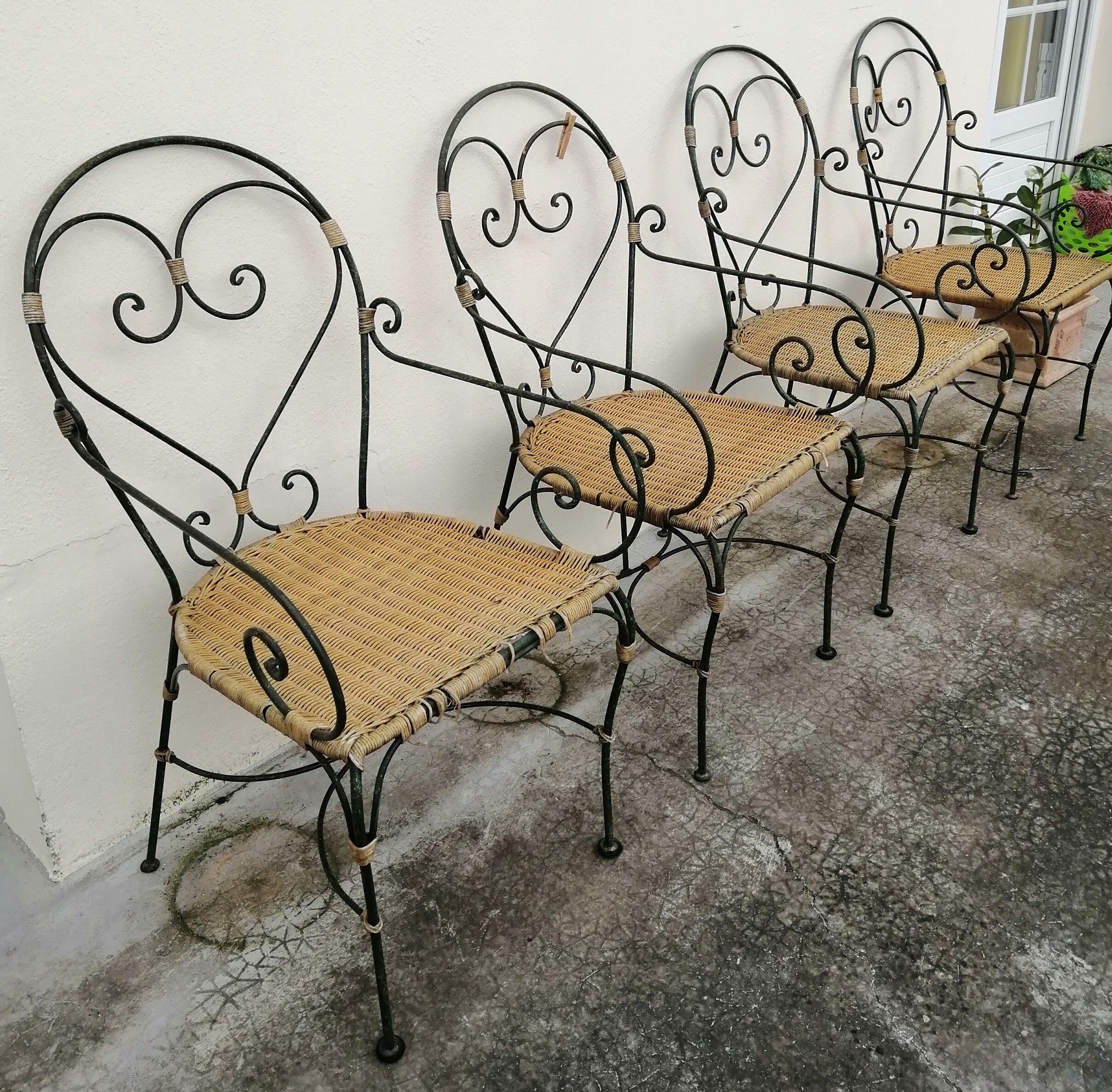 rattan chair and wrought iron