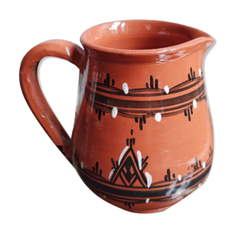 Ochre carafe with white and black geometric friezes