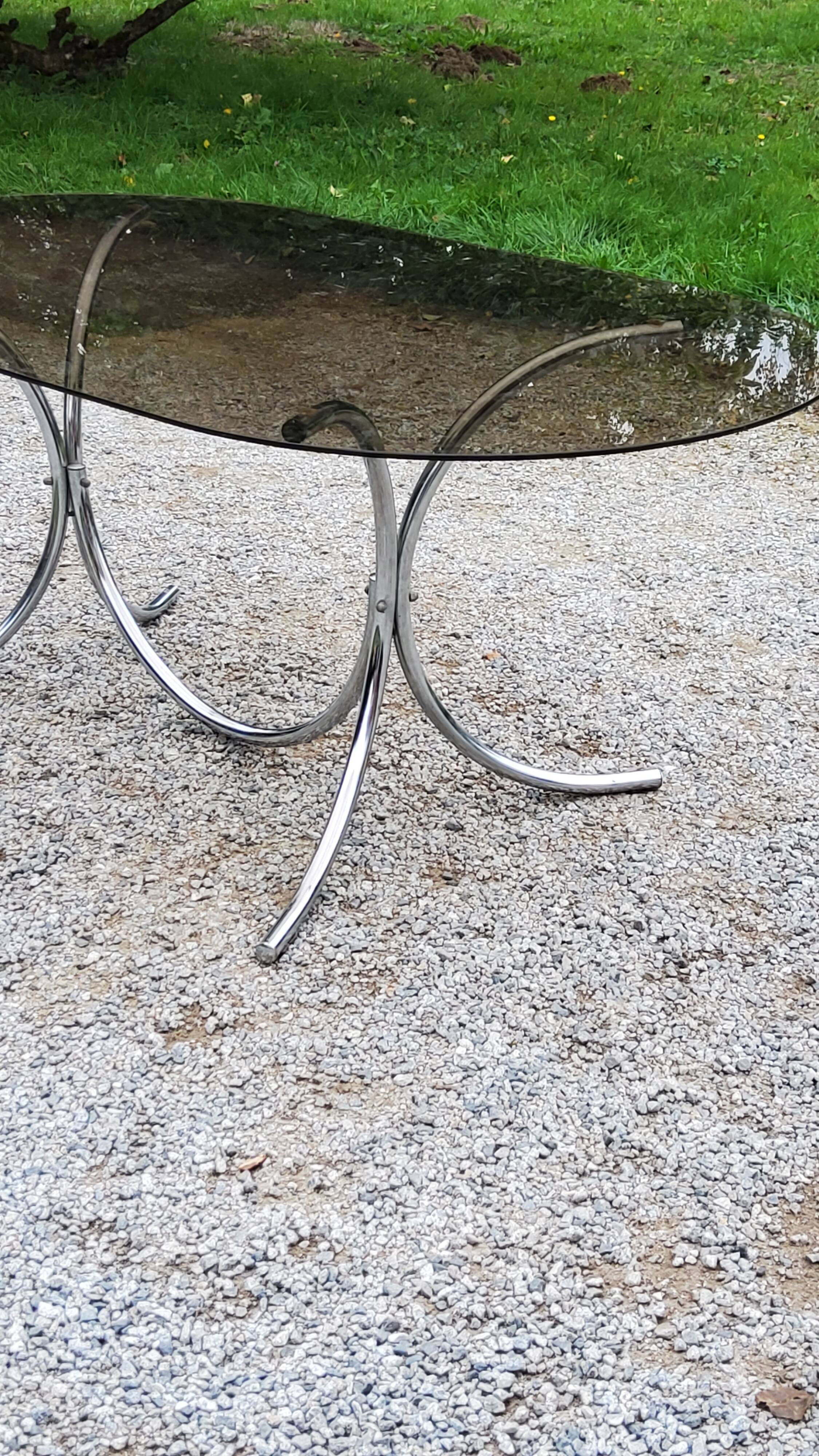 Dining table from the 70s top smoked glass base chrome