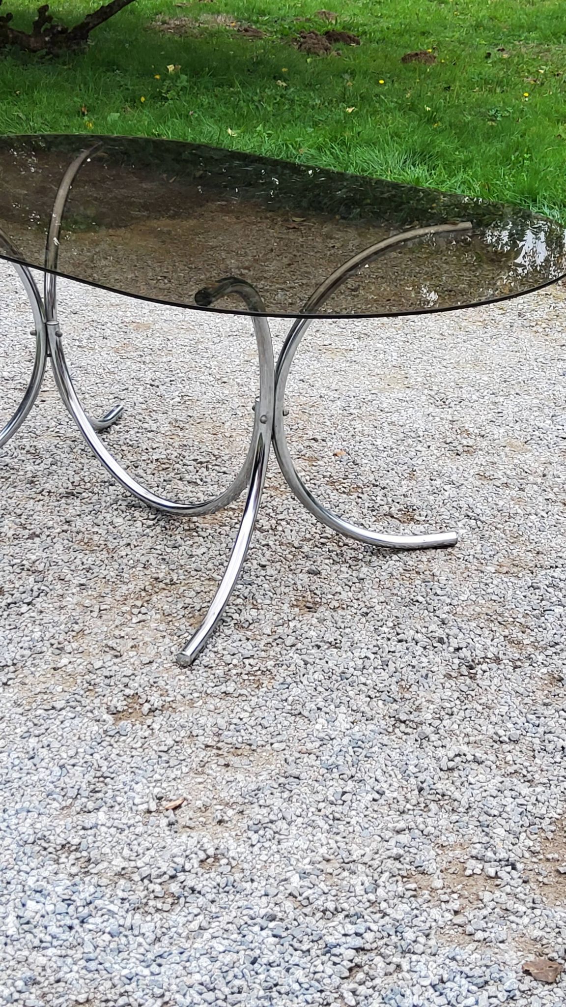 Dining table from the 70s top smoked glass base chrome