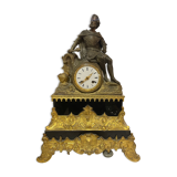 Pendulum in gilded bronze and onyx