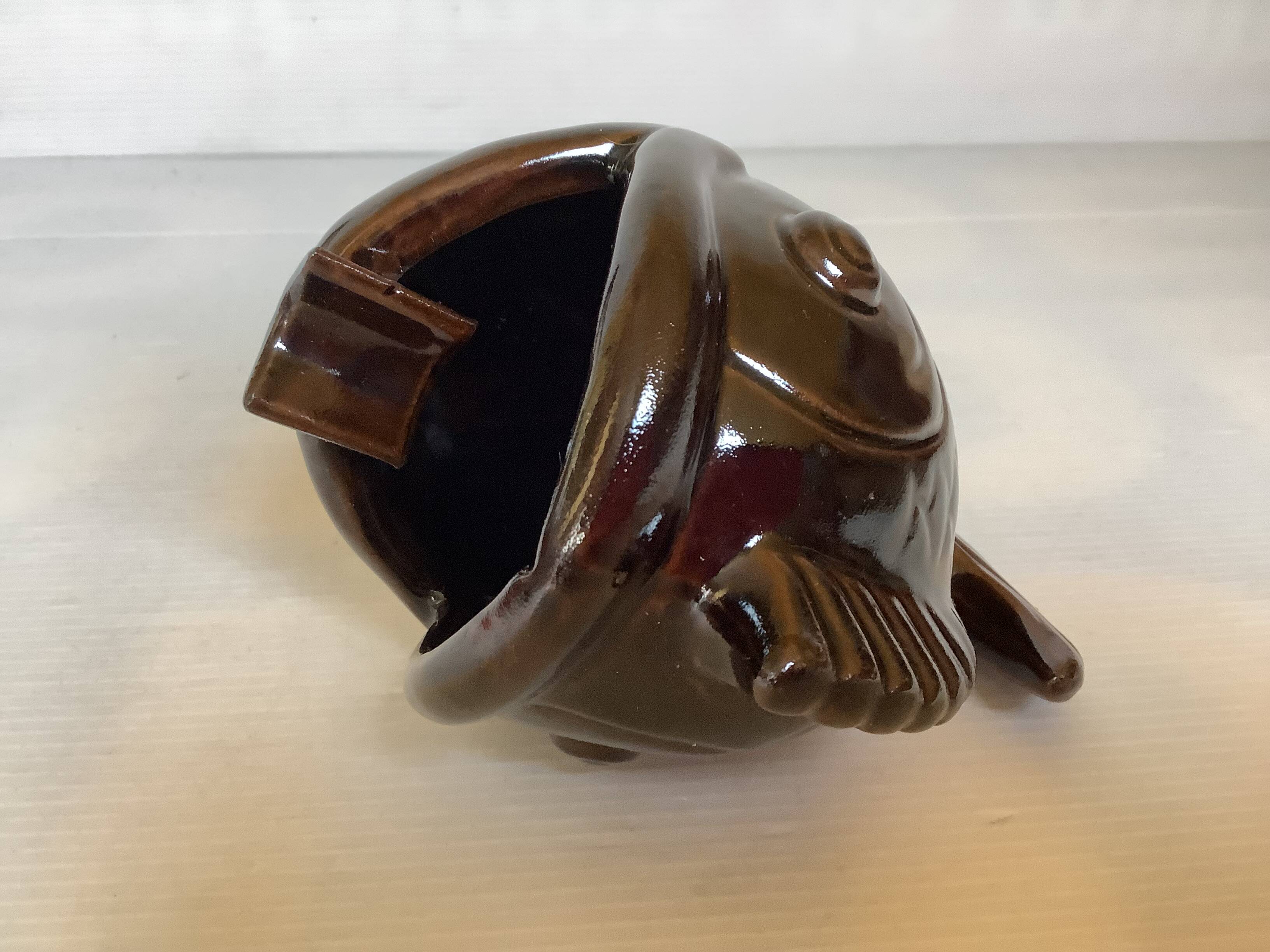 Brown ceramic fish ashtray