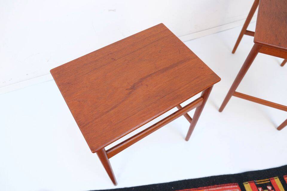 Mid-century side tables and nesting tables, in Wegner Tuck teak, Danish style.