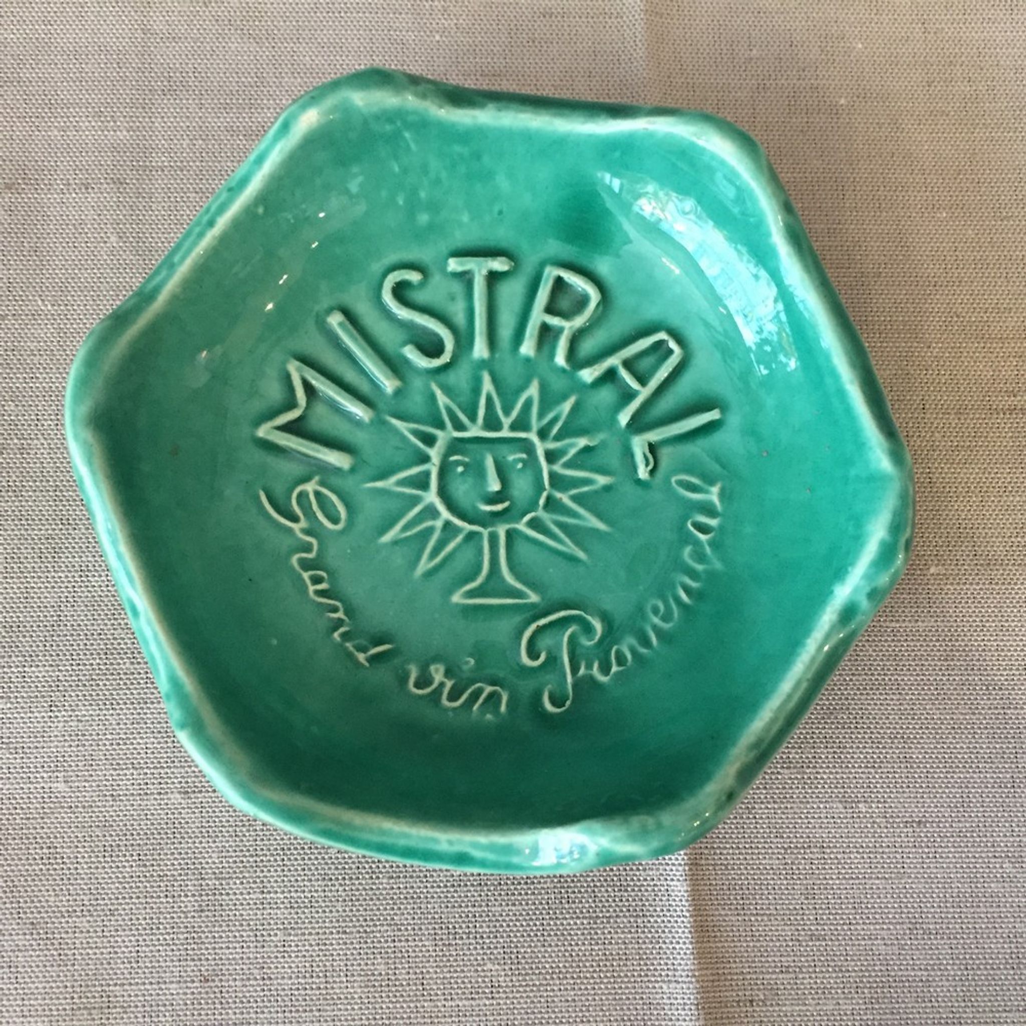 Ashtray or picks up advertising money for the great provencal mistral wine