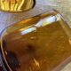 6 small amber glass stemmed glasses