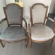 Pair of cabriolet armchairs in light grey and dark grey Louis XV style.