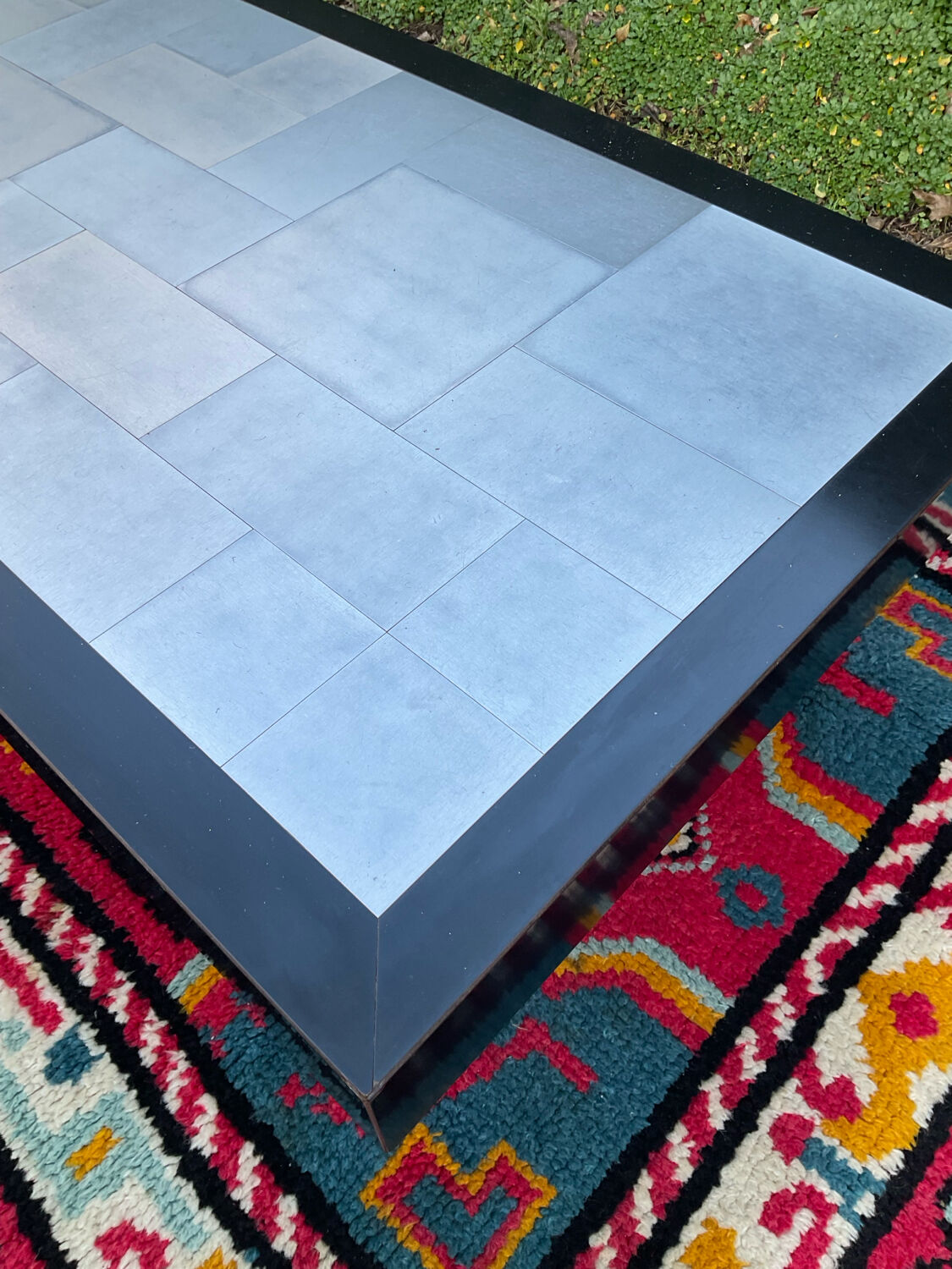 Vintage coffee table in stainless steel and black lacquered wood.