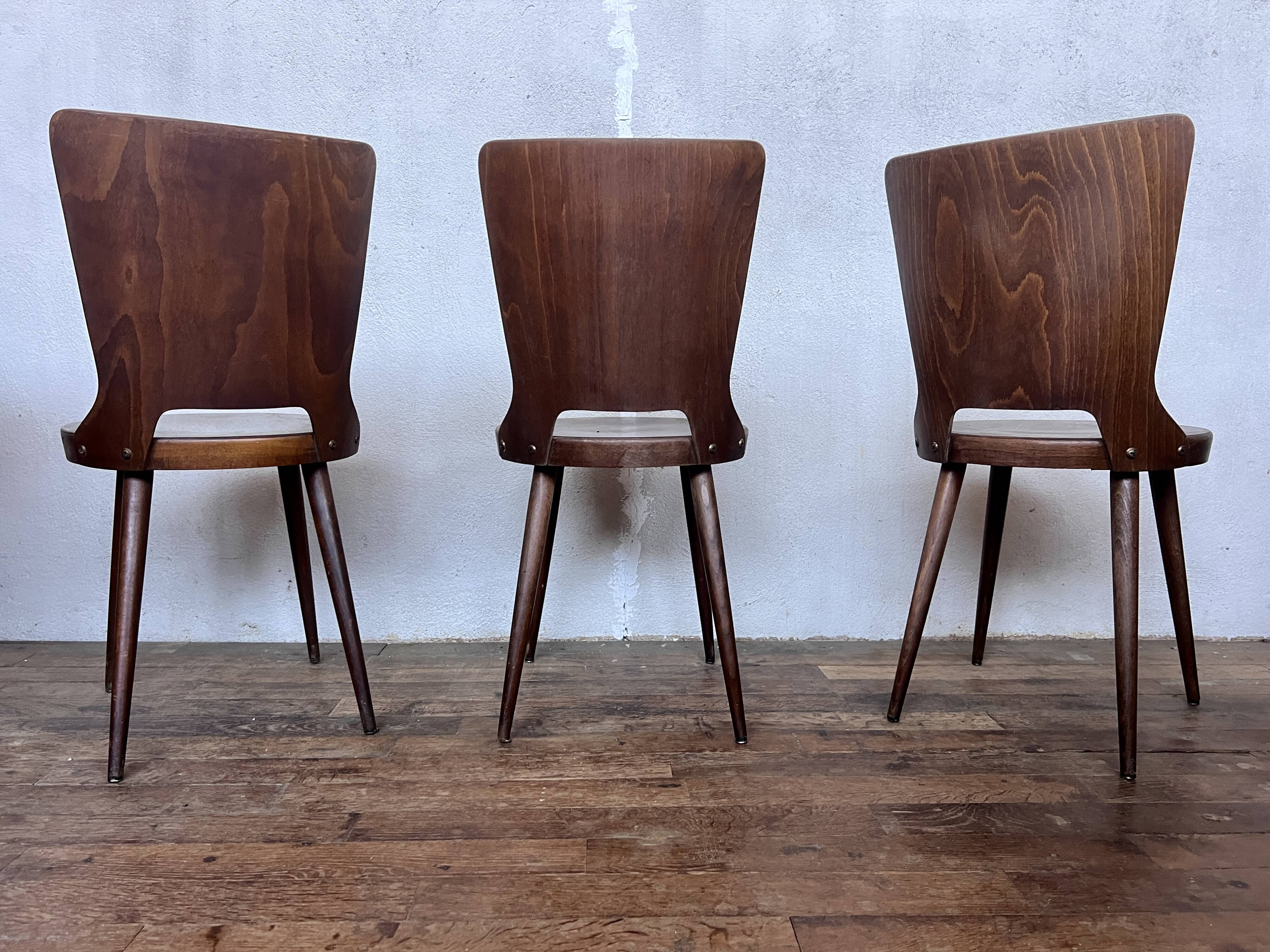 Trio of vintage retro Dove Baumann chairs 1960