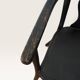 Curved black lacquered wooden armchair in Thonet style