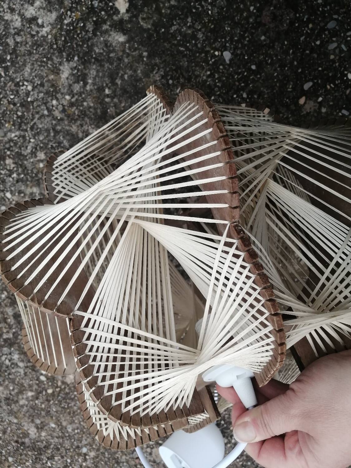 Pair of vintage wooden and rattan straw pendant lights.