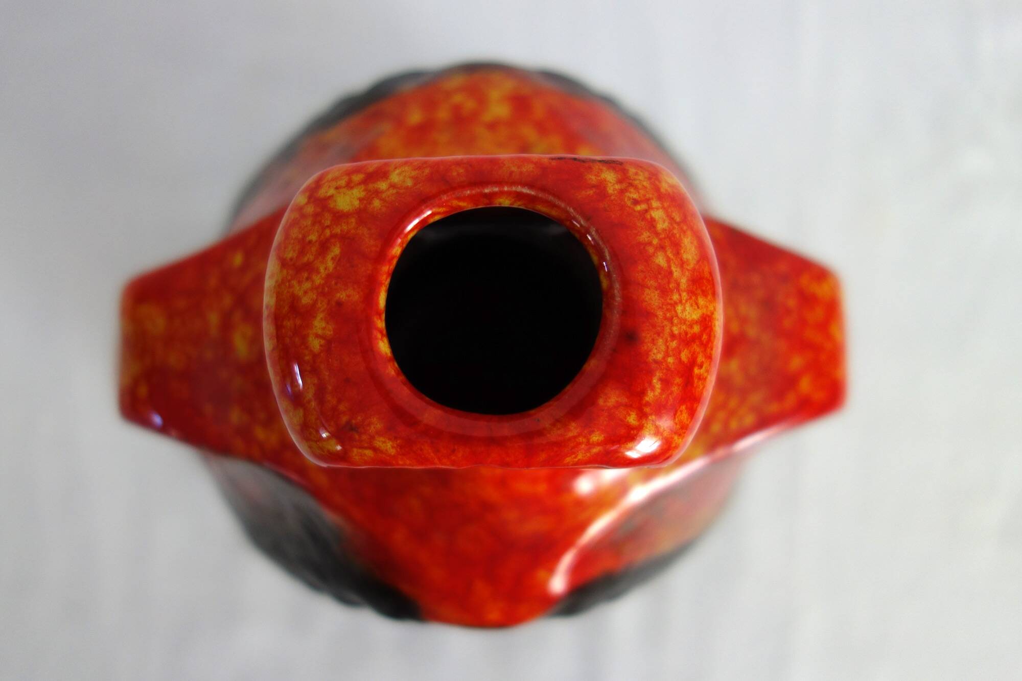Bay Keramik orange-red and black candle holder from the 70s