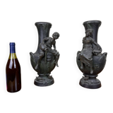 François Moreau: Pair of vases with Napoleon III period characters in regula with bronze patina