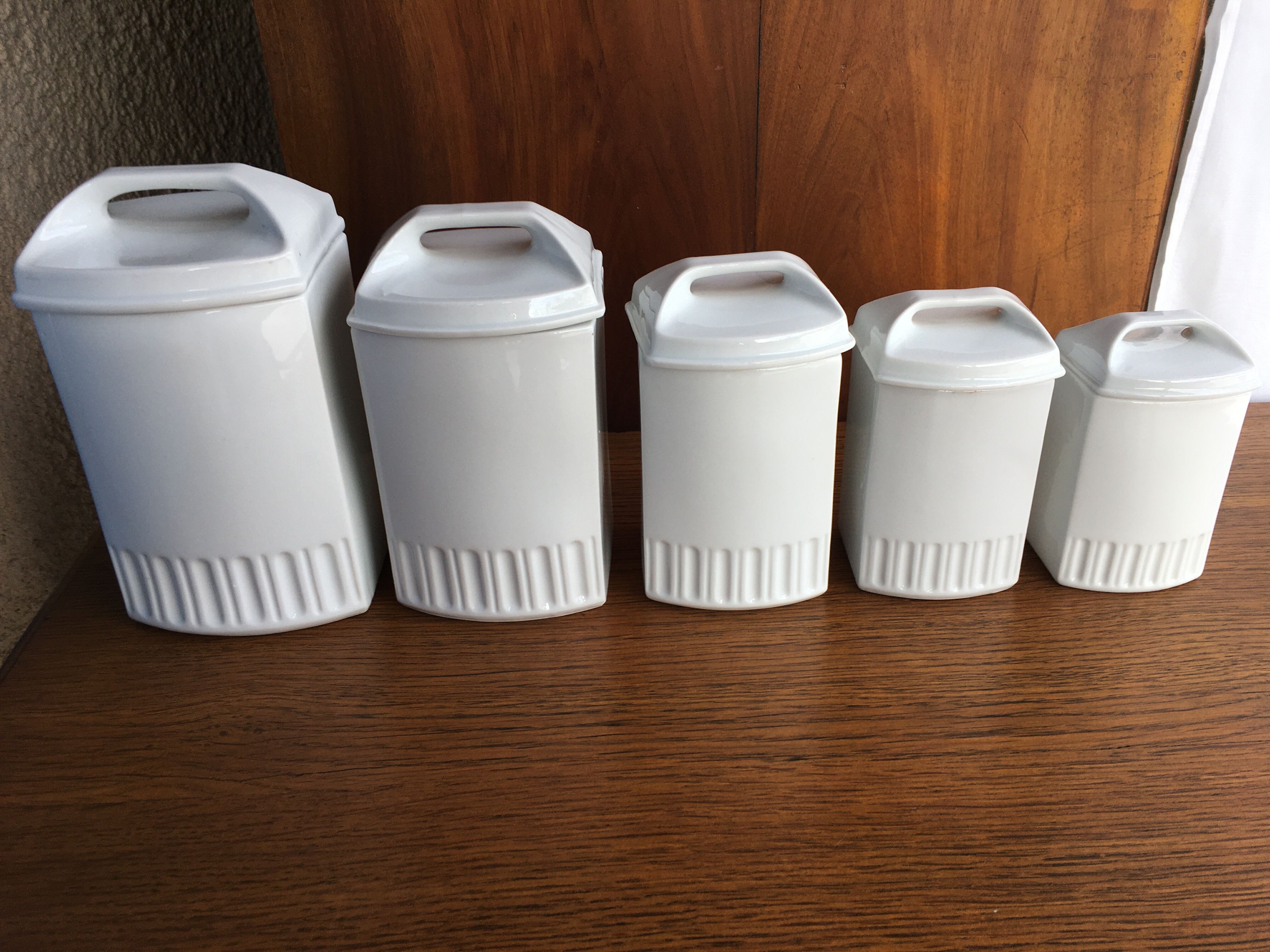Suite of 5 old porcelain spice pots