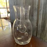 Transparent glass pitcher Mid-Century (1960s) — Czech Republic, bulbous silhouette and integrated handle.