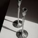 Pair of aluminium candle holders