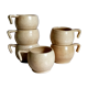 Six vintage potter's ceramic cups with vanilla enamel