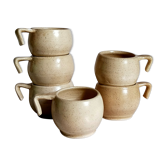 Six tasses céramiques de potier vintages à l'émail vanille