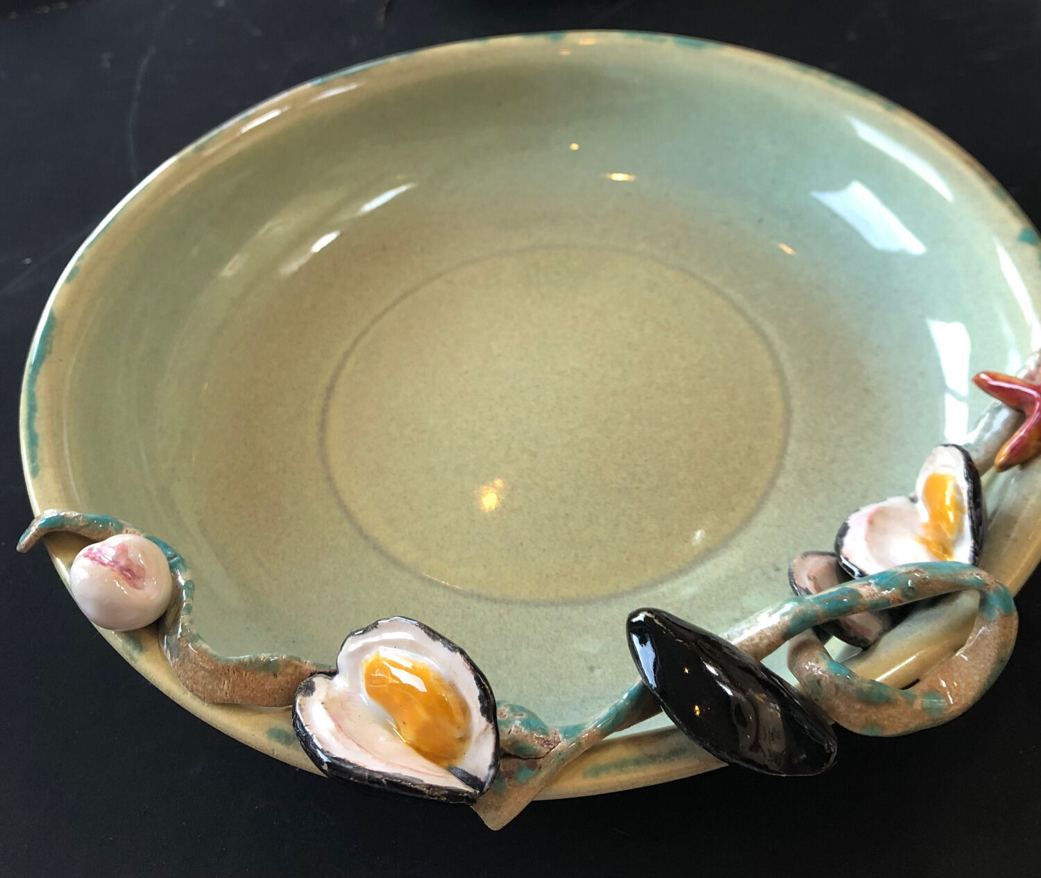 Paris ceramic dish with slip decoration, by Suzy Coste