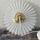 Suspension in electrified serrated white opaline to nine