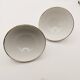2 small gold ceramic bowls