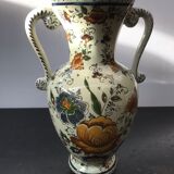 Ancient Delft vase with white ceramics decor vintage flowers