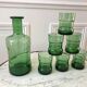 Set of a decanter and 6 glasses colored green bottle 70s