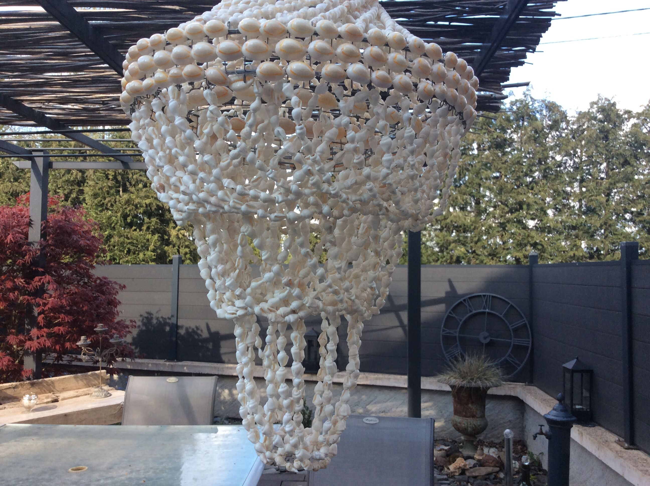 Beautiful bohemian chandelier in seashells