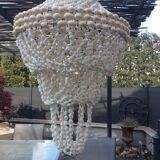 Beautiful bohemian chandelier in seashells
