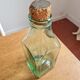 Green blown glass bottle