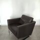 Fauteuil en cuir piétement metal
