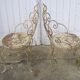 Set of 2 garden chairs and wrought iron pedestal table