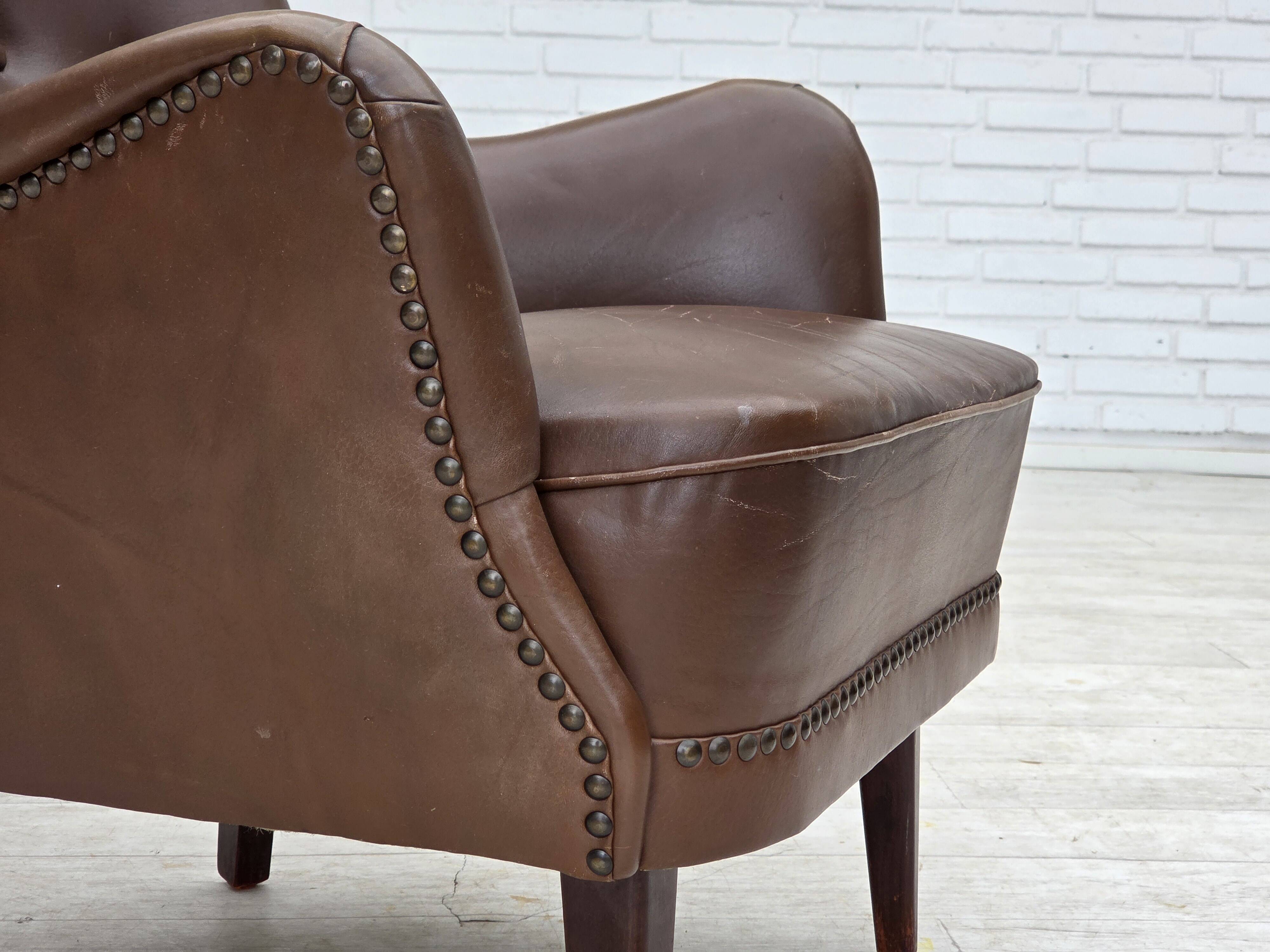 1960s, Danish armchair, furniture leather, ash wood legs.