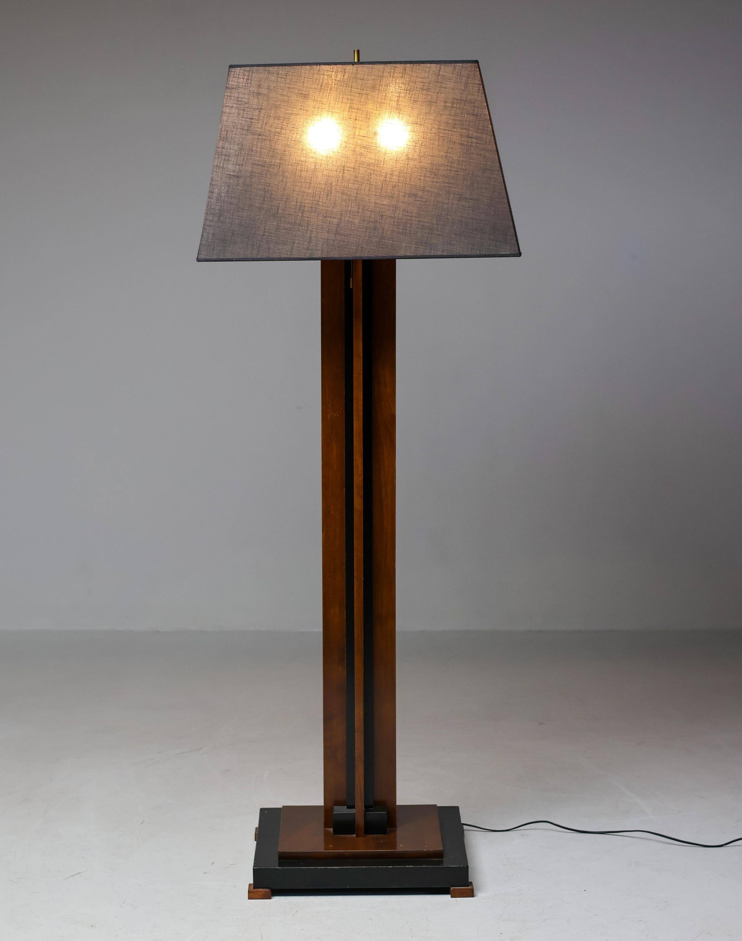 Amsterdam School floor lamp in partially ebonised cherry with a black linen shade.