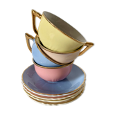 4 coffee cups in pastel colored earthenware